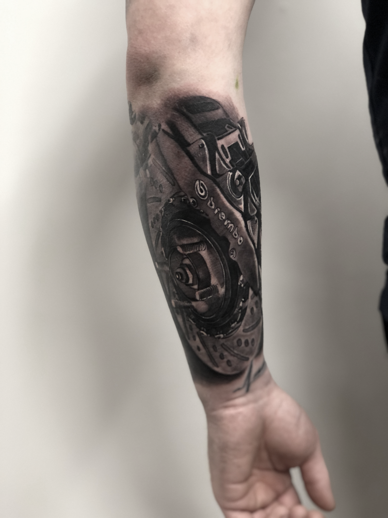 Brembo Brake Disc Mechanical Forearm Sleeve Tattoo by Esther – Black & Grey | Unicorn Tattoo Art Collective, Ashford Surrey