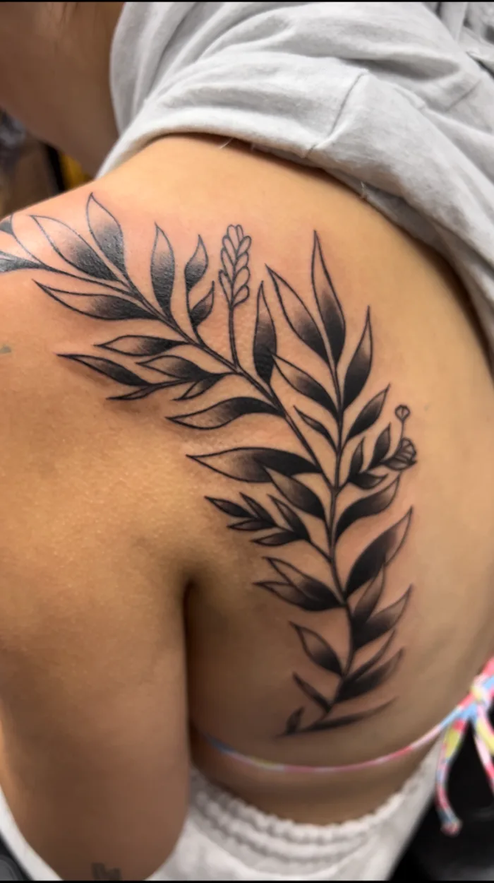 Black and grey botanical leaf branch shoulder tattoo by Esther, Unicorn Tattoo Art Collective, Ashford Surrey