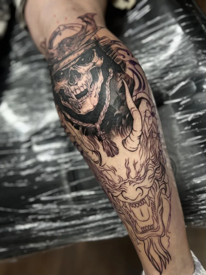 Japanese style samurai skull and oni demon calf tattoo in progress, black and grey, by Esther, Unicorn Tattoo Art Collective, Ashford Surrey
