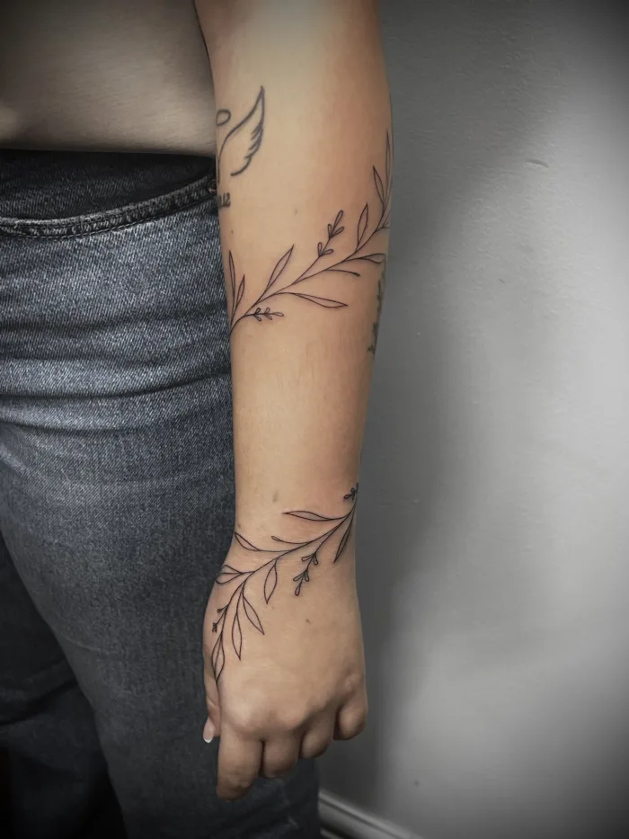 Fine Line Floral Arm Tattoo Minimalist Wrap Design Unicorn Tattoo Art Collective Ashford Surrey