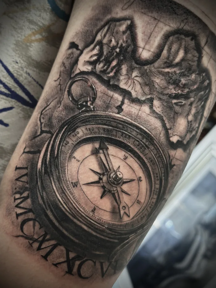 Compass and map half sleeve tattoo by Esther at Unicorn Tattoo Art Collective Ashford Surrey