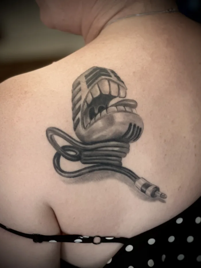 Healed black and grey surreal realism tattoo by Esther at Unicorn Tattoo Art Collective in Ashford, Surrey