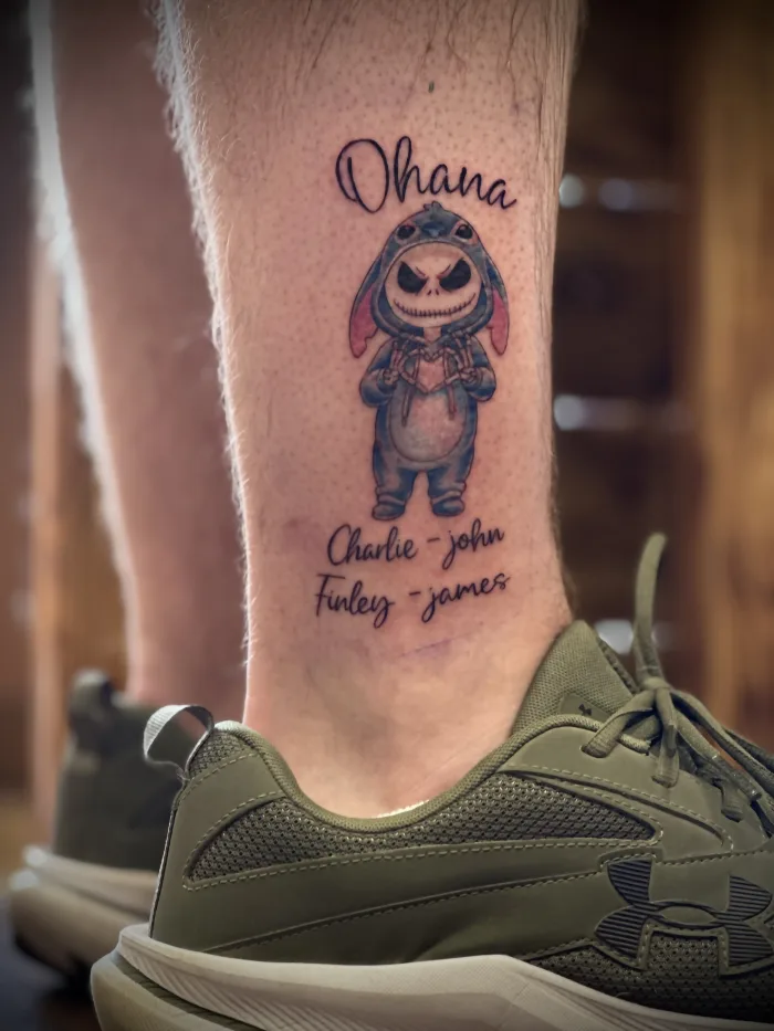 Colour Ohana tattoo featuring Jack Skellington in a Stitch costume, created by Esther in Ashford, Surrey